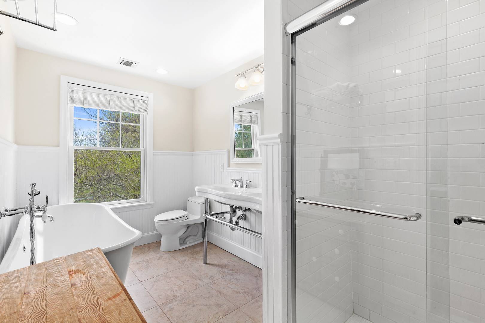 Undisclosed Address Bridgehampton, NY 11932 - Photo 12 of 17 a bathroom with a bathtub shower sink and toilet