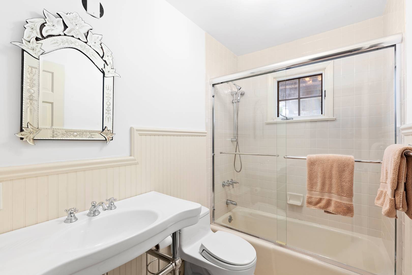 Undisclosed Address Bridgehampton, NY 11932 - Photo 10 of 17 a bathroom with a sink a toilet and shower