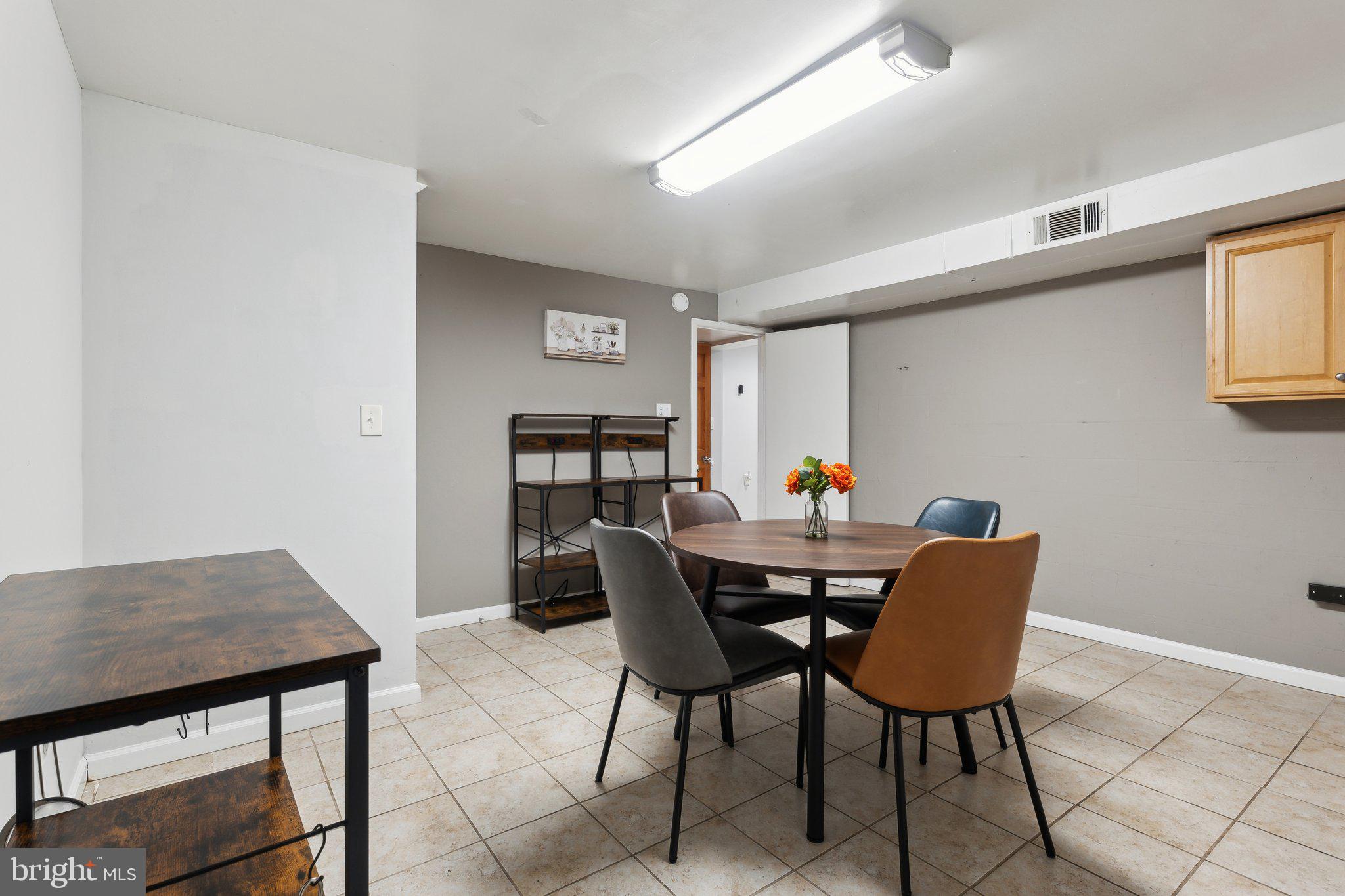 9425 Weaver Street Silver Spring, MD 20901 - Photo 24 of 40 Lower Level Kitchen & Laundry Area w/ Storage