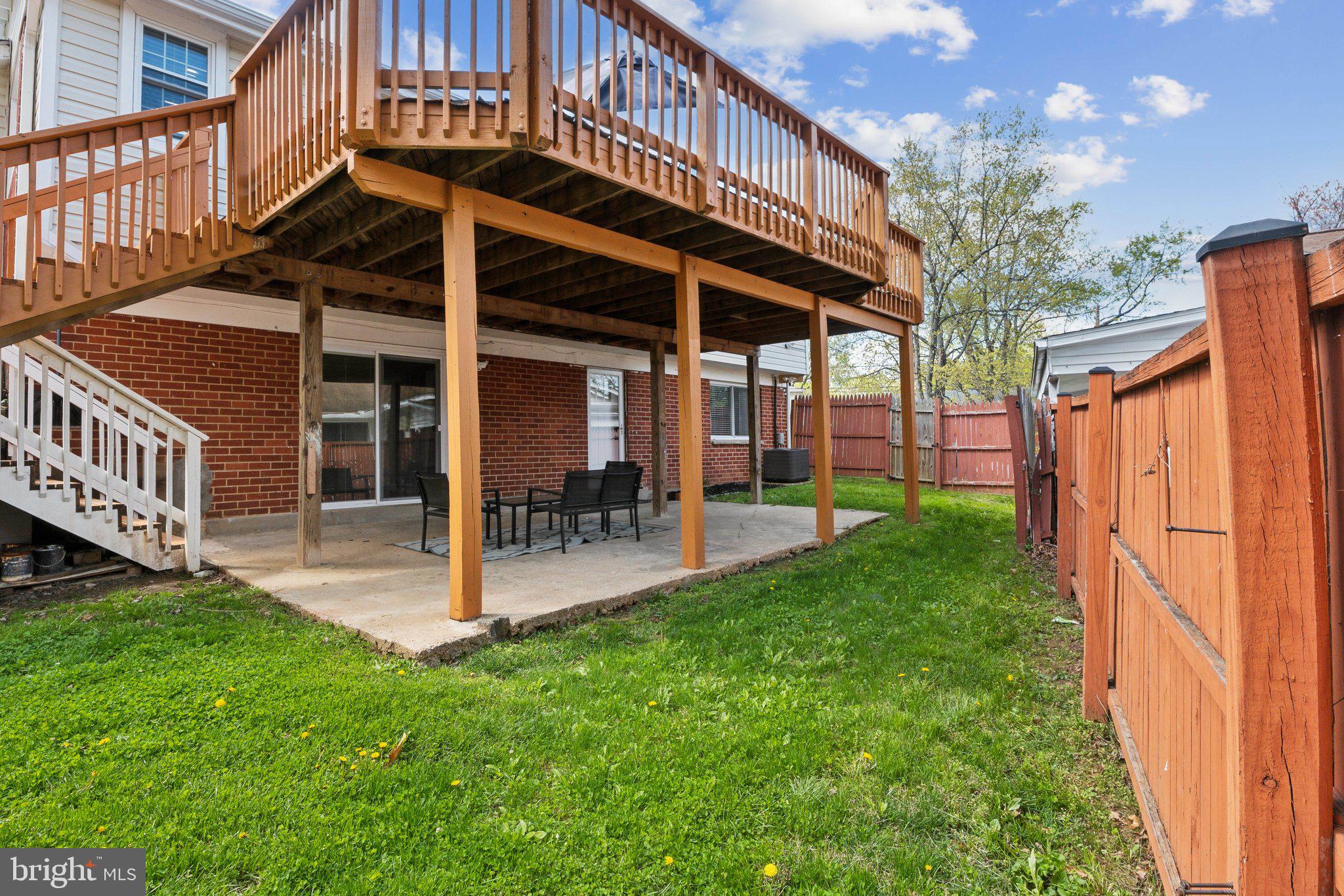 9425 Weaver Street Silver Spring, MD 20901 - Photo 3 of 40 Patio Below Rear Deck and Fenced Back Yard