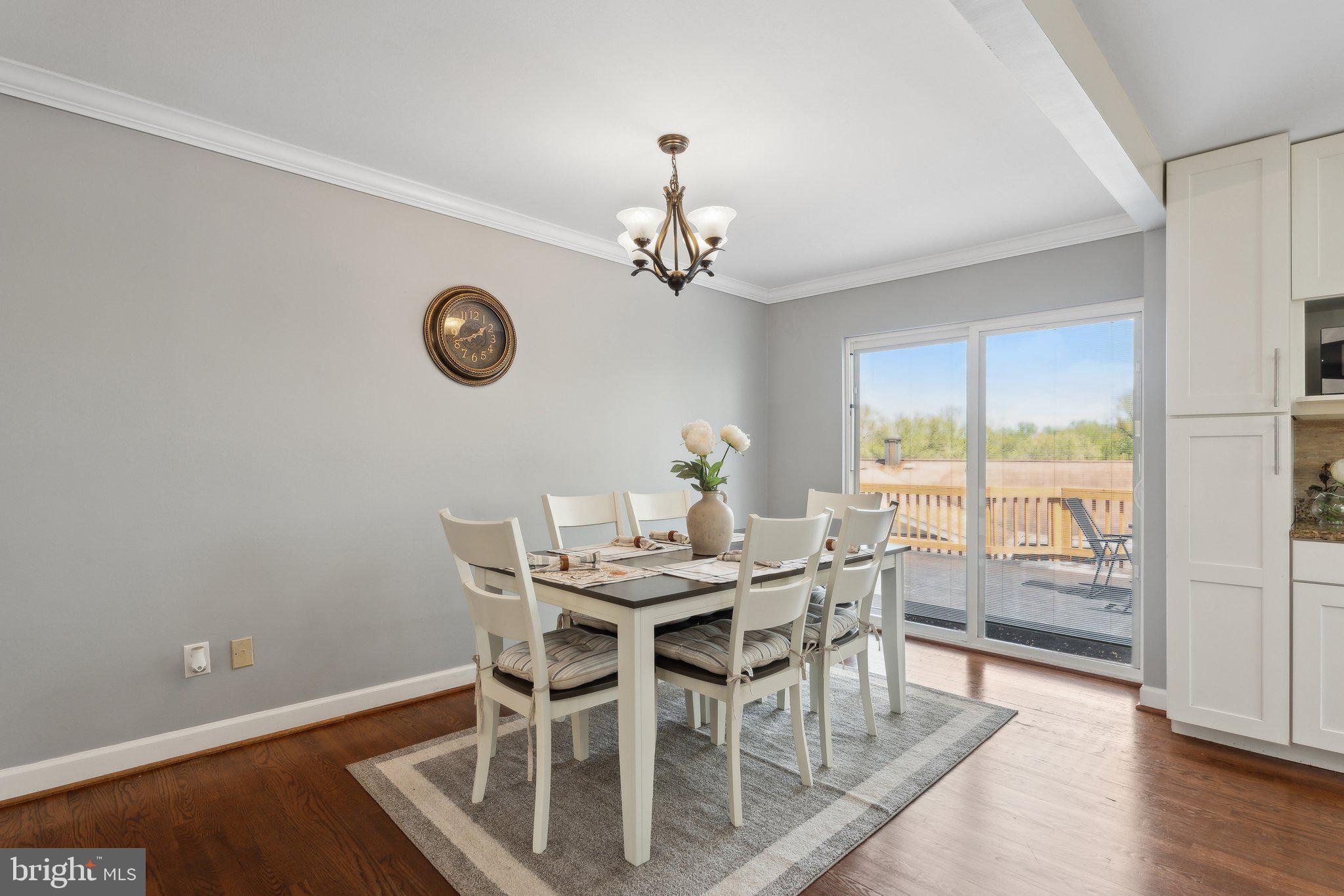 9425 Weaver Street Silver Spring, MD 20901 - Photo 7 of 40 Dining to Deck Upgraded Slider w/ Built In Blinds