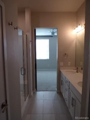 a bathroom with a bathtub and a sink