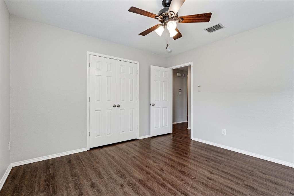 3005 Groveland Terrace Denton, TX 76210 - Photo 20 of 26 a view of an empty room with wooden floor