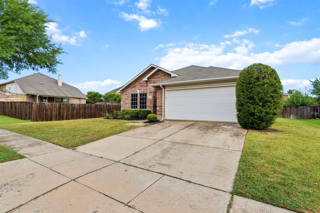 3005 Groveland Terrace Denton, TX 76210 - Photo 2 of 26 a front view of house with yard and green space