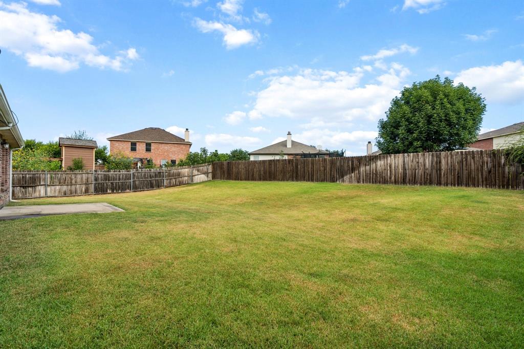 3005 Groveland Terrace Denton, TX 76210 - Photo 25 of 26 a view of a backyard