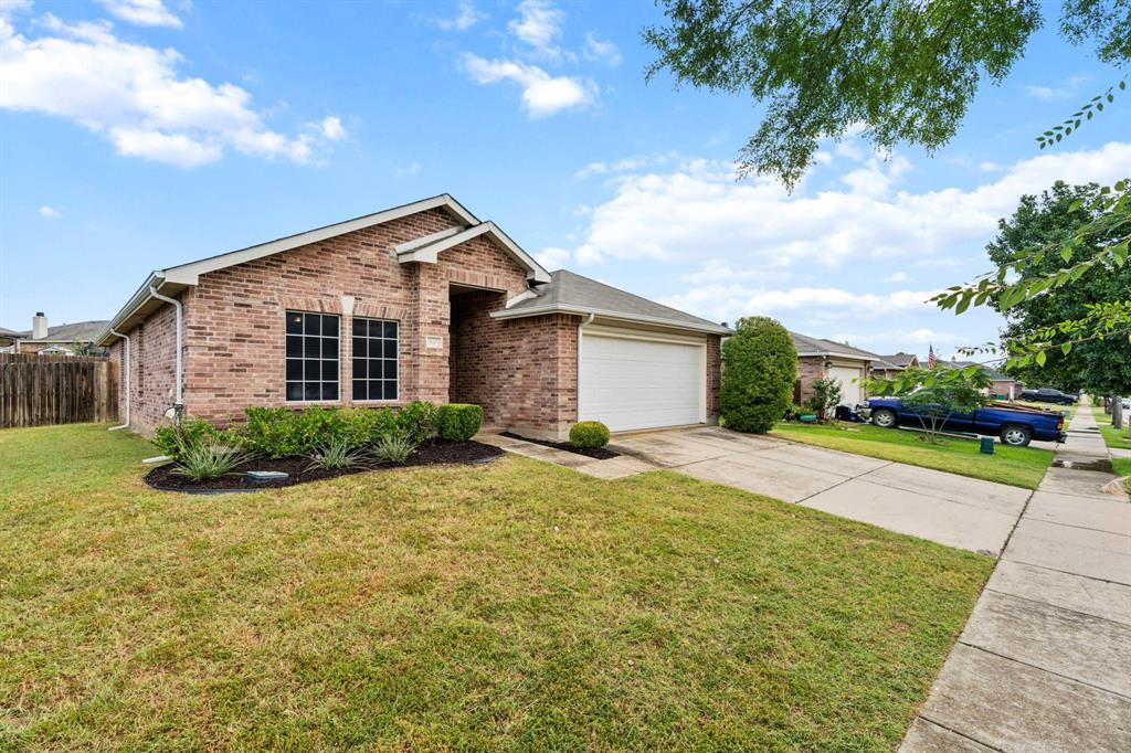 3005 Groveland Terrace Denton, TX 76210 - Photo 3 of 26 a front view of house with yard and green space