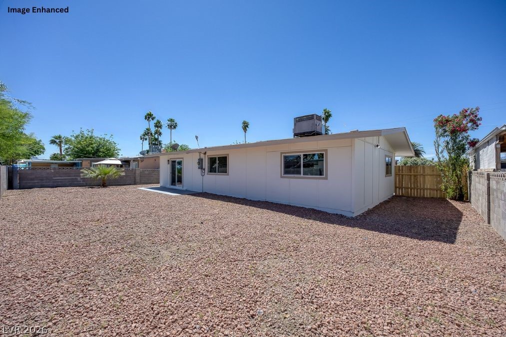 2484 Anglia Street Las Vegas, NV 89142 - Photo 20 of 20 Enjoy outdoor living in this spacious backyard with ample room for relaxation and entertainment.