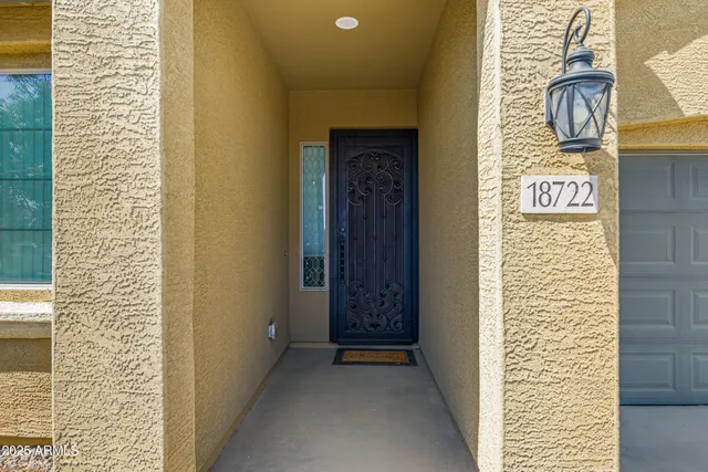 a view of a door and a window