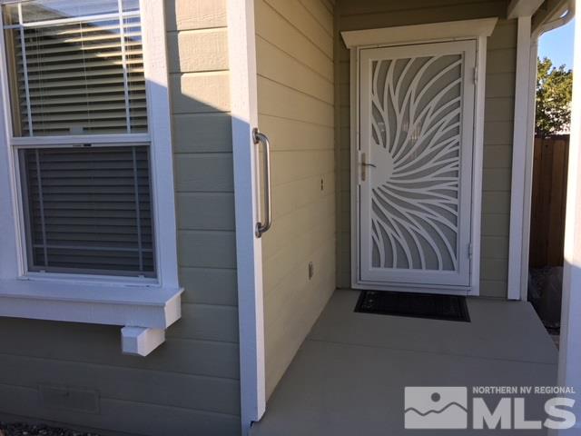 7687 Corso Street Reno, NV 89506 - Photo 3 of 24 a view of front door