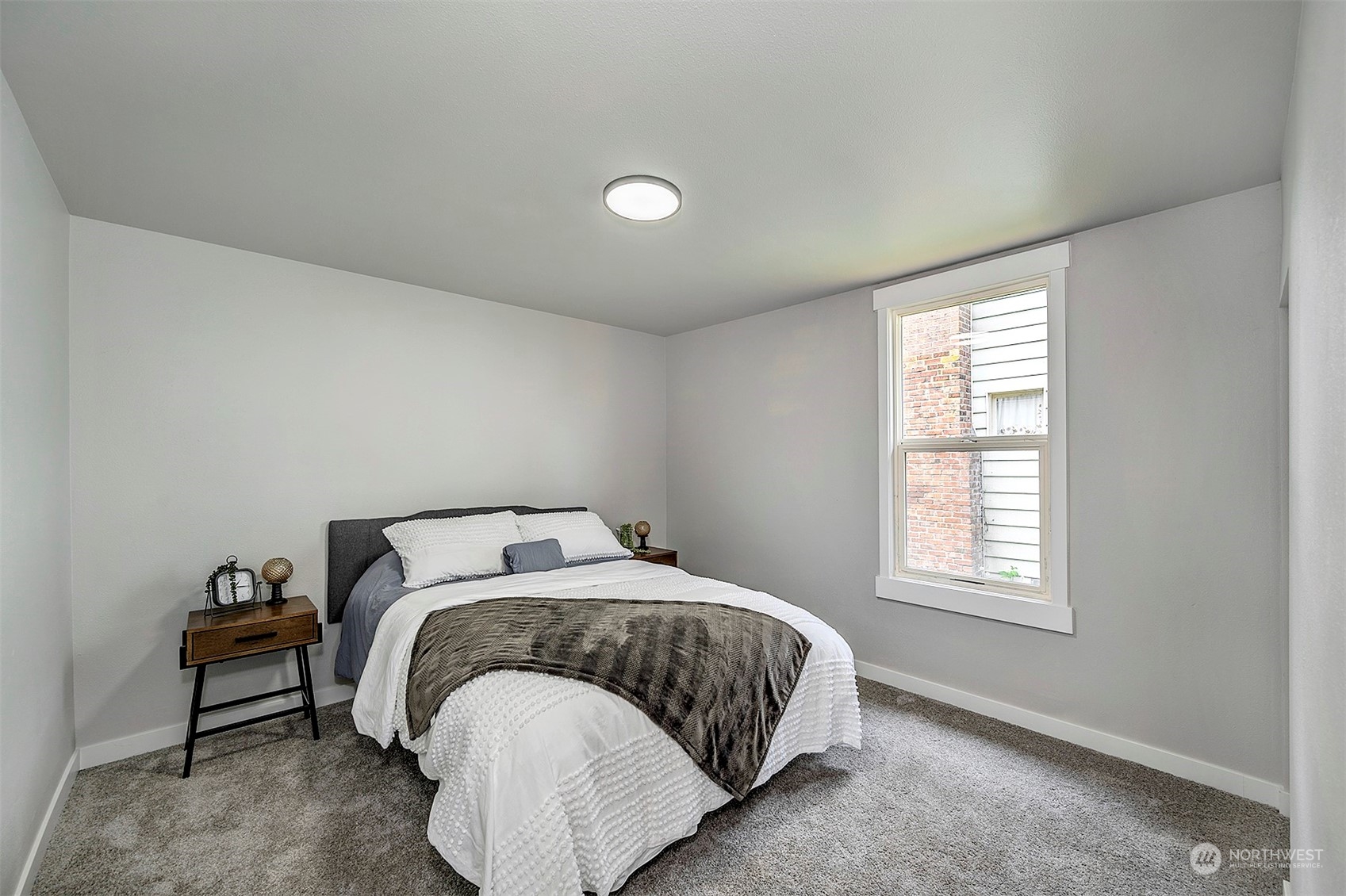 2707 Victor Place Everett, WA 98201 - Photo 11 of 30 a bedroom with a bed and a window