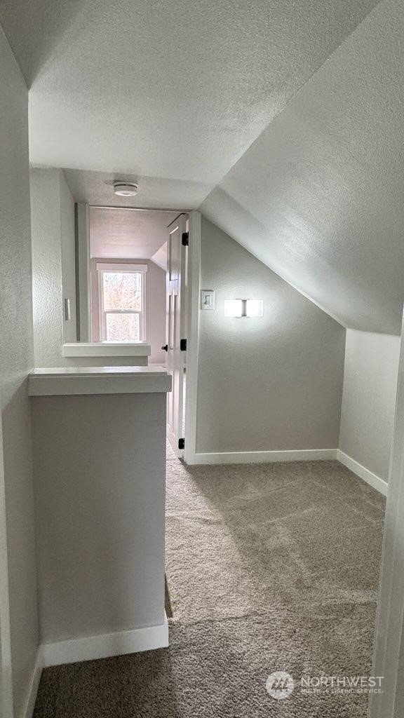 2707 Victor Place Everett, WA 98201 - Photo 14 of 30 an empty room with a fireplace and windows