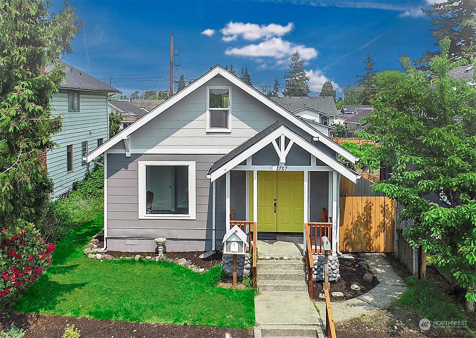 2707 Victor Place Everett, WA 98201 - Photo 17 of 30 a front view of house with backyard and green space