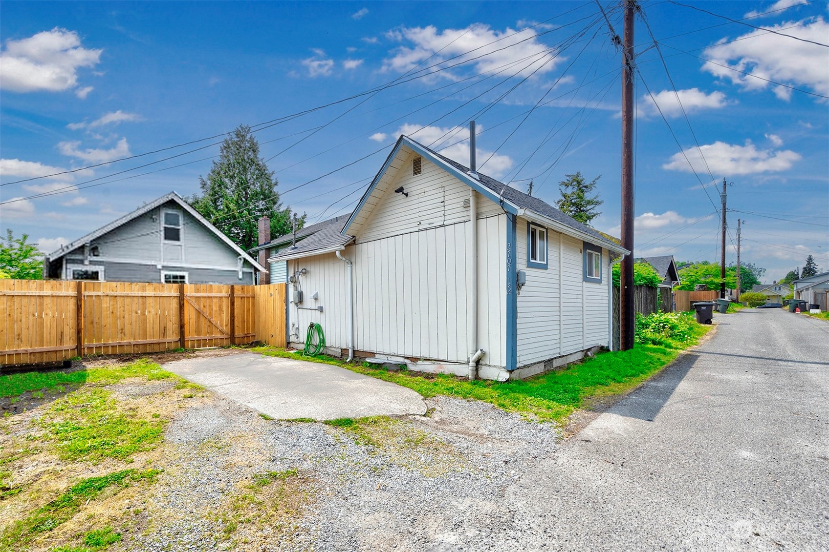 2707 Victor Place Everett, WA 98201 - Photo 30 of 30 a front view of a house with a yard and garage
