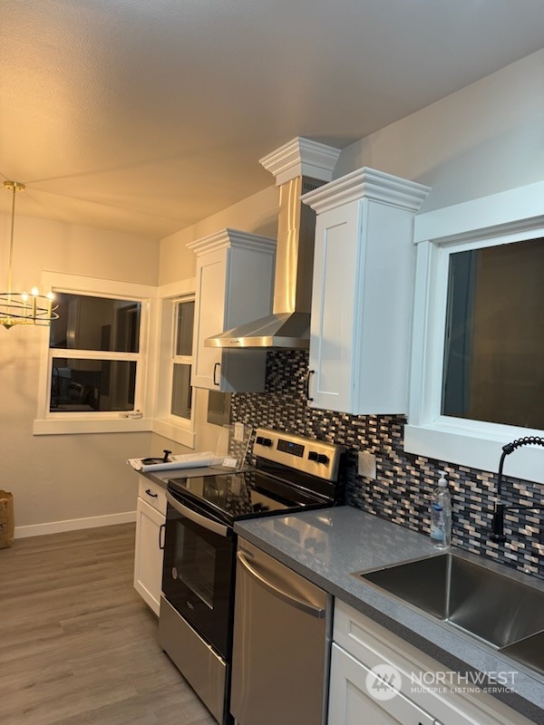 2707 Victor Place Everett, WA 98201 - Photo 6 of 30 a kitchen with a sink stove and microwave