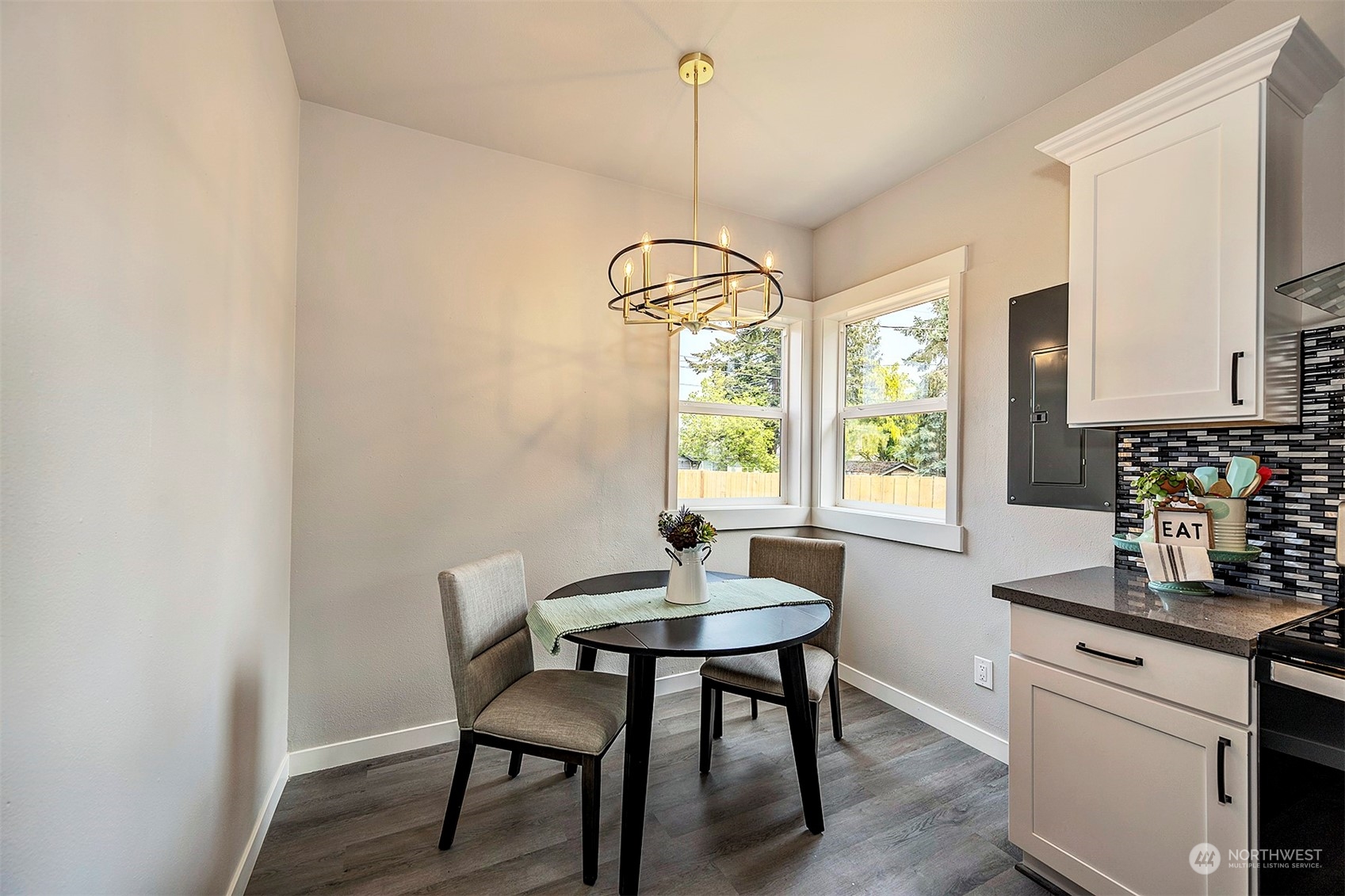 2707 Victor Place Everett, WA 98201 - Photo 9 of 30 a dining room with a table and chairs