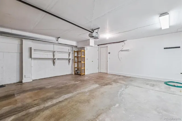 a aerial view of a house with a yard