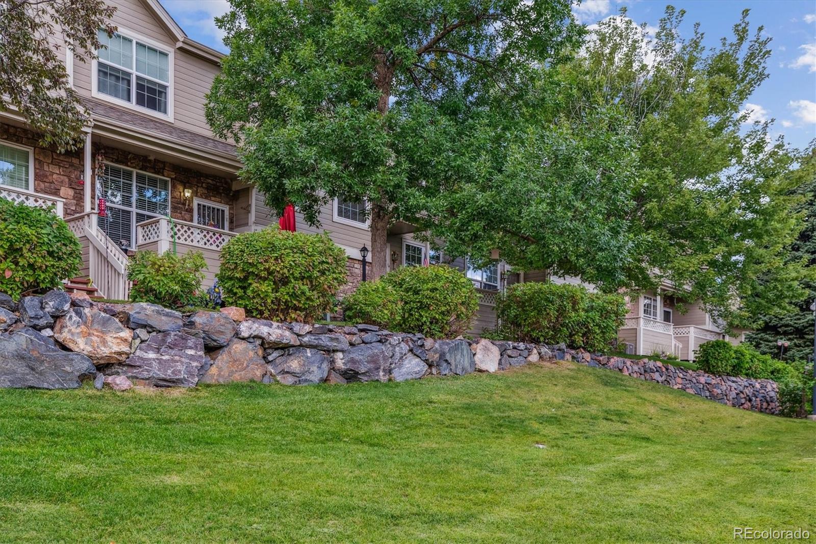 260 West Jamison Circle, Unit 13 Littleton, CO 80120 - Photo 21 of 24 a aerial view of a house with a yard