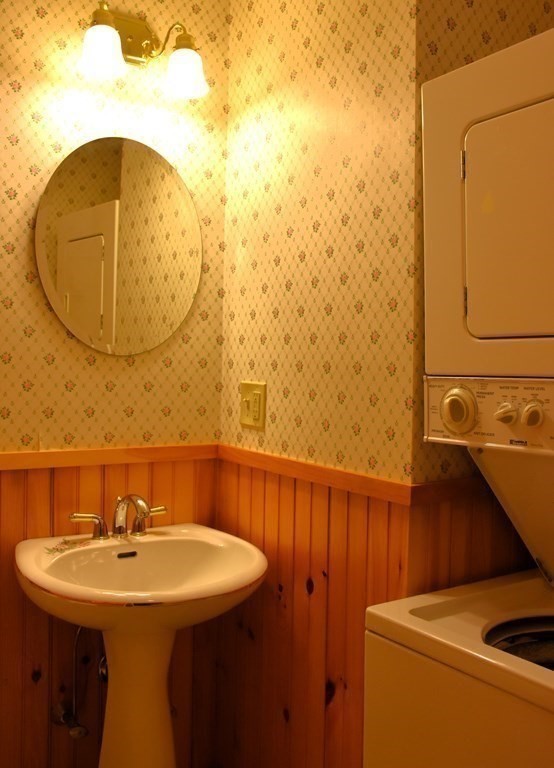 145 Baker Pond Road Dudley, MA 01571 - Photo 18 of 27 a bathroom with a sink and a mirror