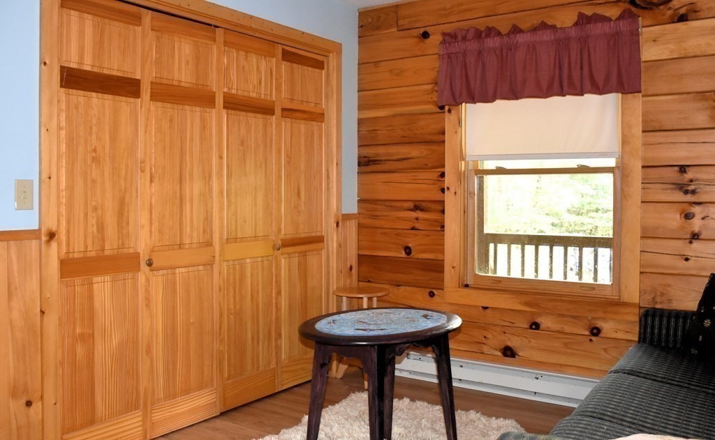145 Baker Pond Road Dudley, MA 01571 - Photo 25 of 27 a bathroom with a sink and a mirror