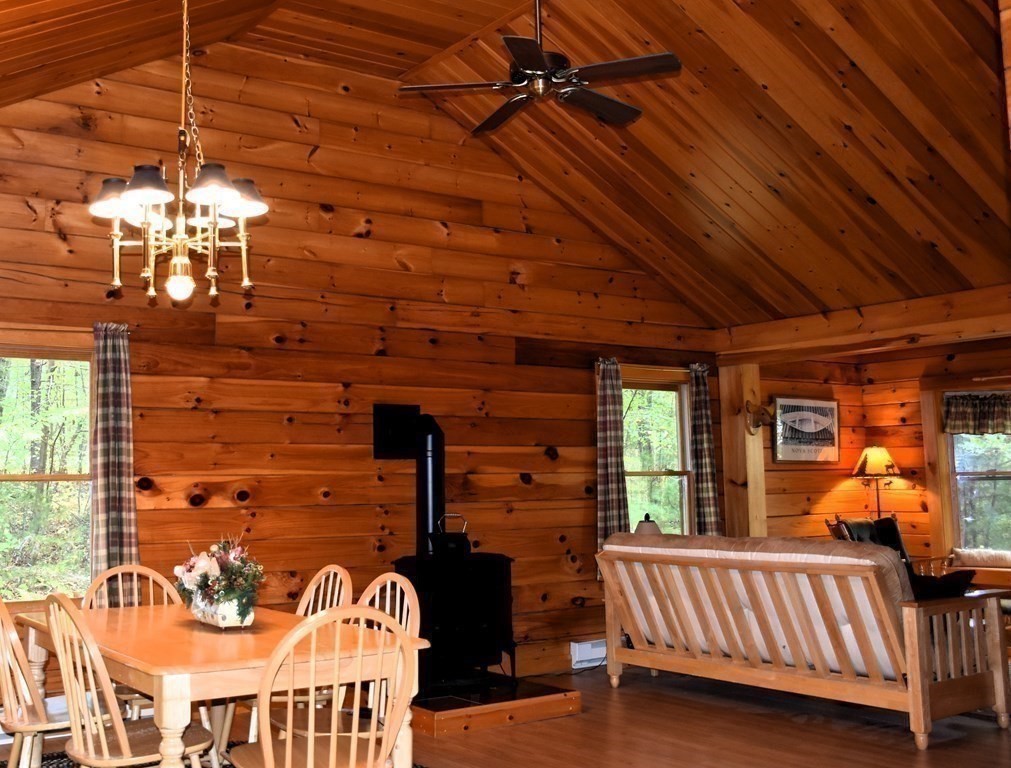 145 Baker Pond Road Dudley, MA 01571 - Photo 10 of 27 a view of a room with furniture and chandelier