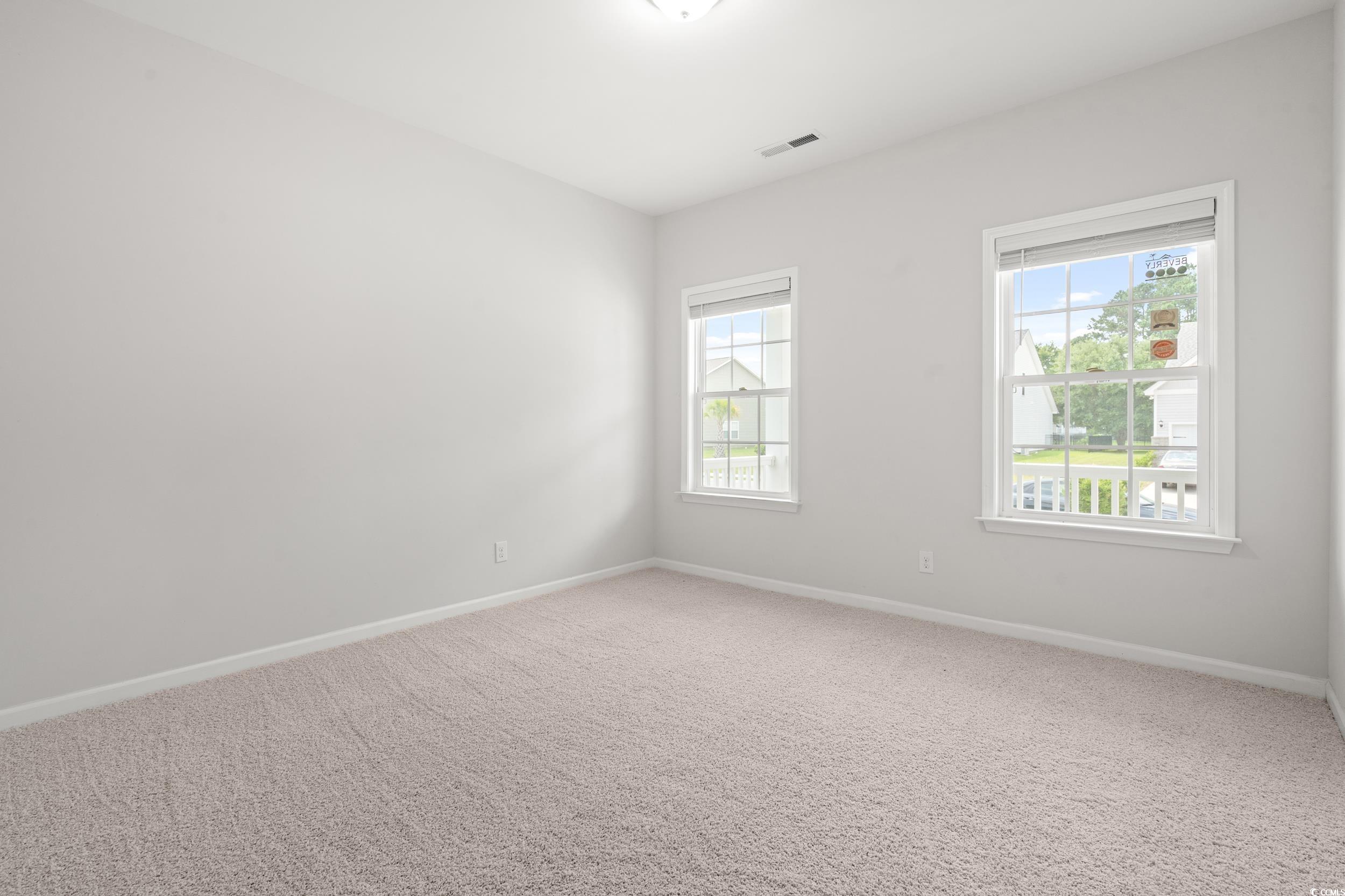512 Charlton Boulevard Georgetown, SC 29440 - Photo 9 of 35 Spare room with baseboards and carpet