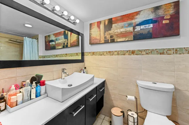 a bed room with a bed and a window