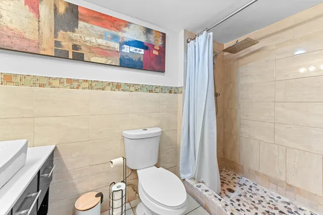 a bed room with a bed and a couch