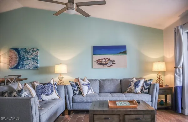 a living room with furniture and a couch