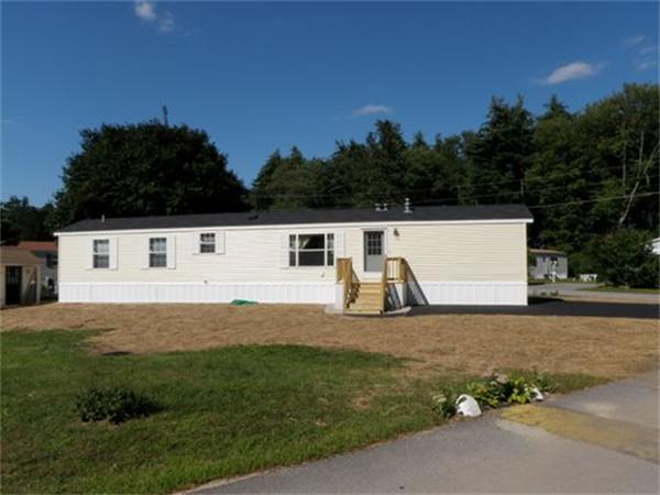 22 Willow Road Newton, NH 03858 - Photo 1 of 1 a view of a back yard of the house