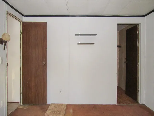 a view of a room that has a window in it