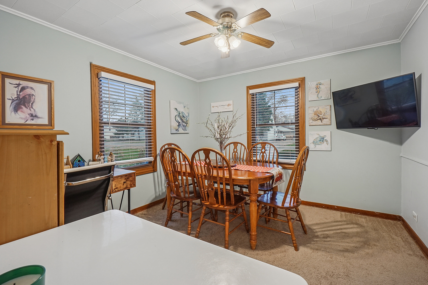 14317 Kilbourn Avenue Midlothian, IL 60445 - Photo 6 of 17 a view of a a dining room with furniture window and outside view