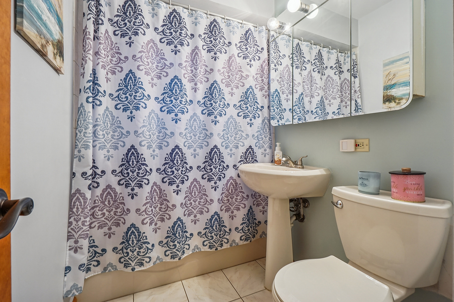 14317 Kilbourn Avenue Midlothian, IL 60445 - Photo 7 of 17 a bathroom with a sink toilet and a mirror