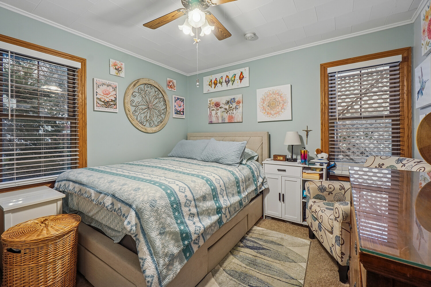 14317 Kilbourn Avenue Midlothian, IL 60445 - Photo 8 of 17 a bedroom with a bed and a chandelier