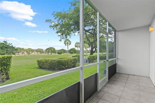 a view of a garden from a balcony