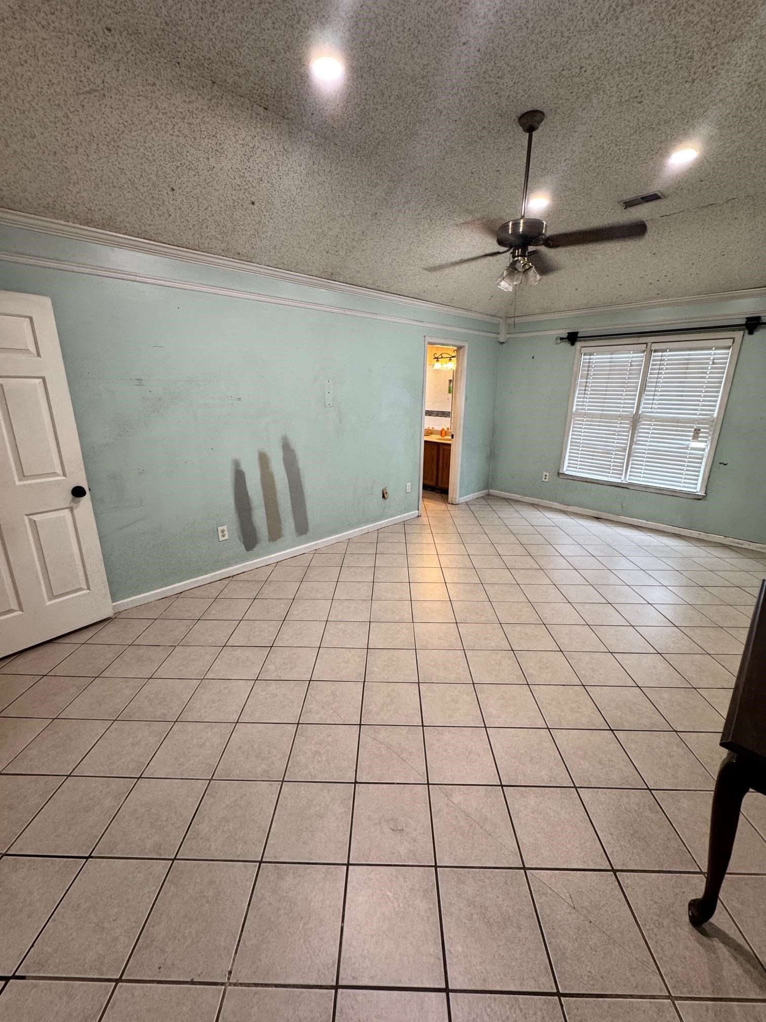 4709 Valene Circle Memphis, TN 38141 - Photo 11 of 23 a large white bed in a room