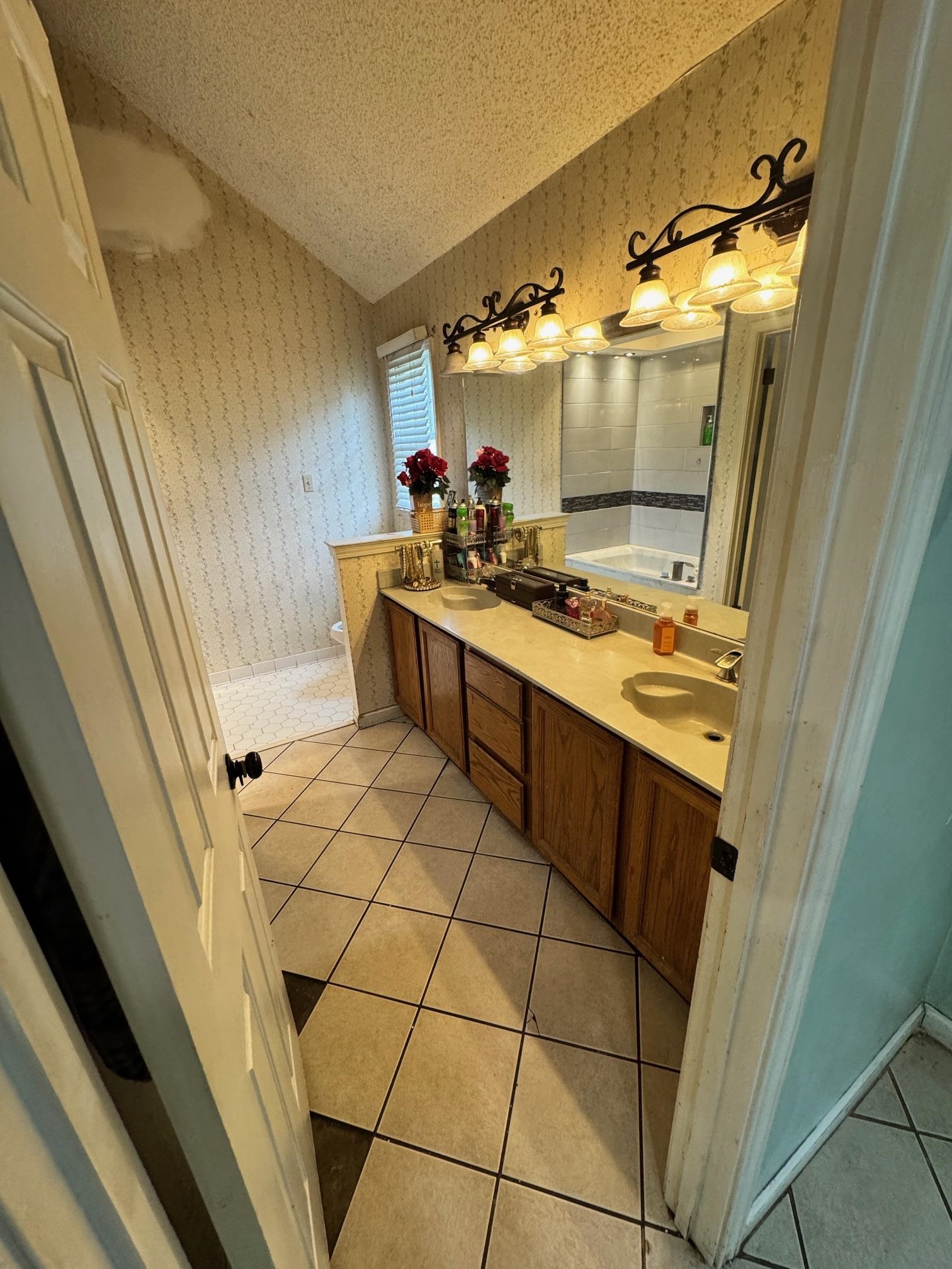 4709 Valene Circle Memphis, TN 38141 - Photo 12 of 23 a kitchen with a sink and cabinets