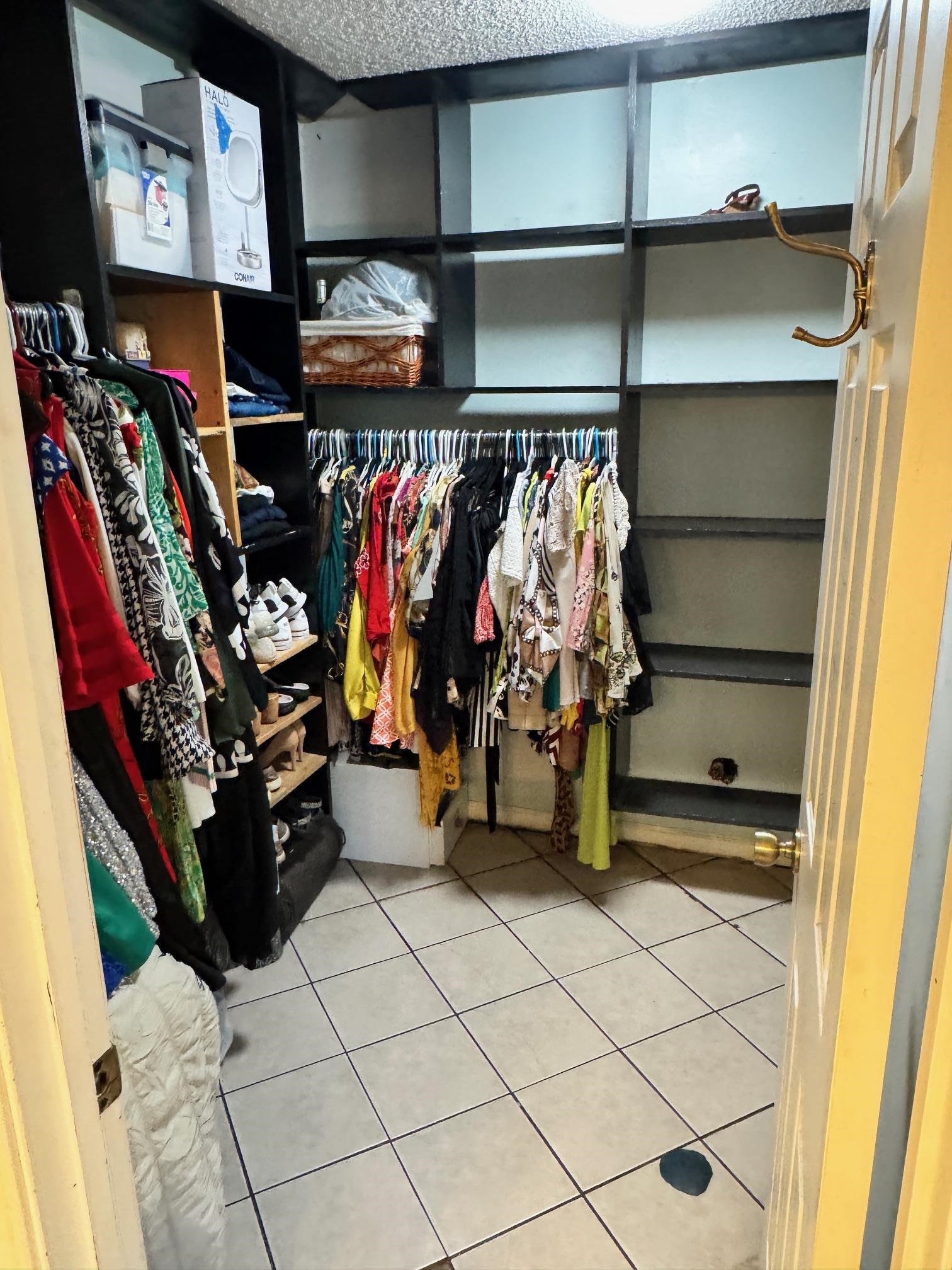 4709 Valene Circle Memphis, TN 38141 - Photo 14 of 23 a view of walk in closet with clothes