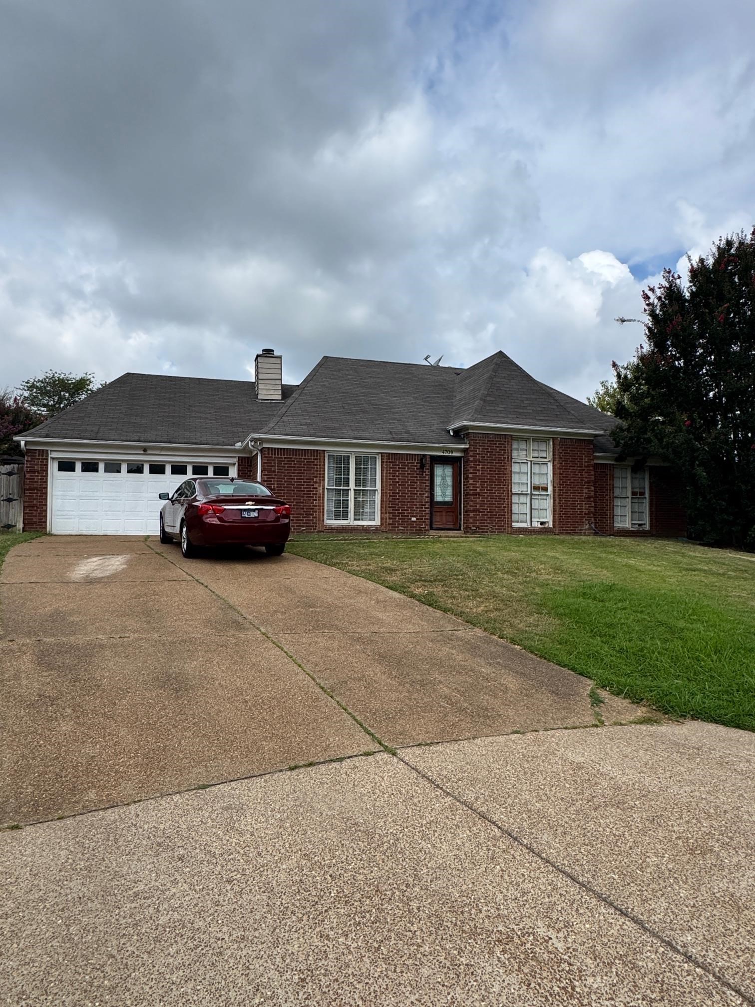 4709 Valene Circle Memphis, TN 38141 - Photo 2 of 23 front view of house with a yard