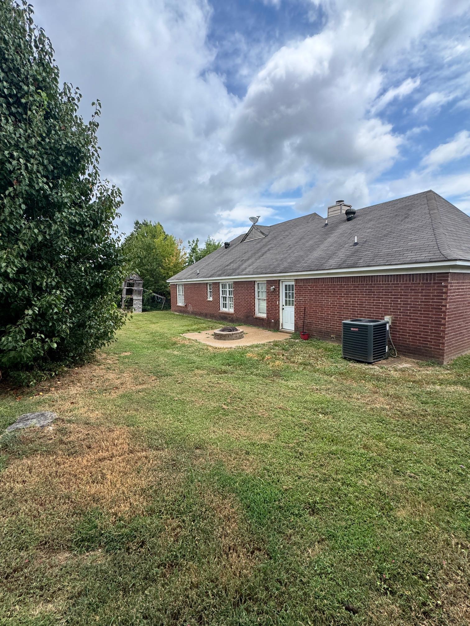 4709 Valene Circle Memphis, TN 38141 - Photo 22 of 23 a aerial view of a house with a yard