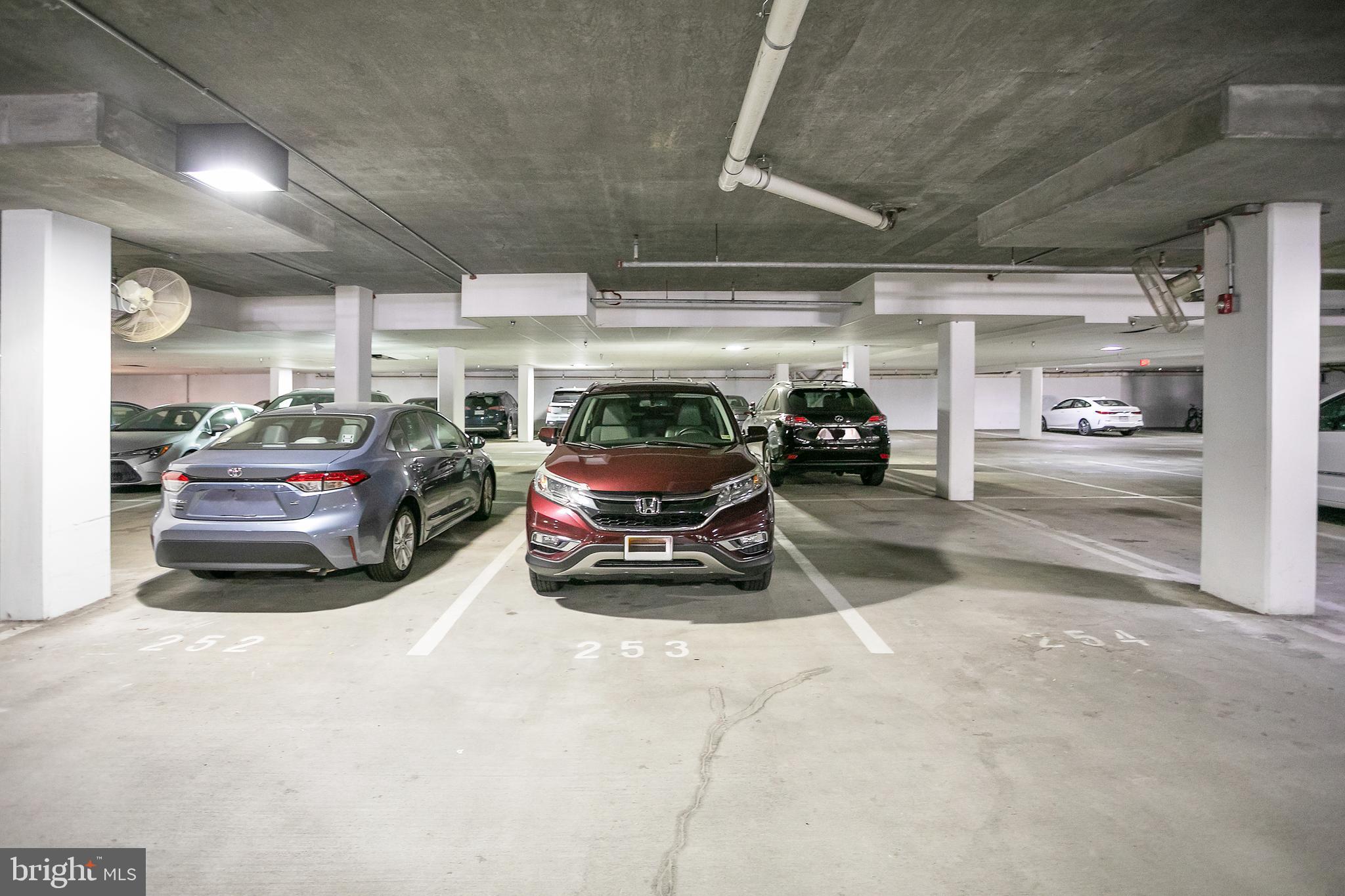 400 Cameron Station Boulevard, Unit 308 Alexandria, VA 22304 - Photo 21 of 46 a car parked in a garage