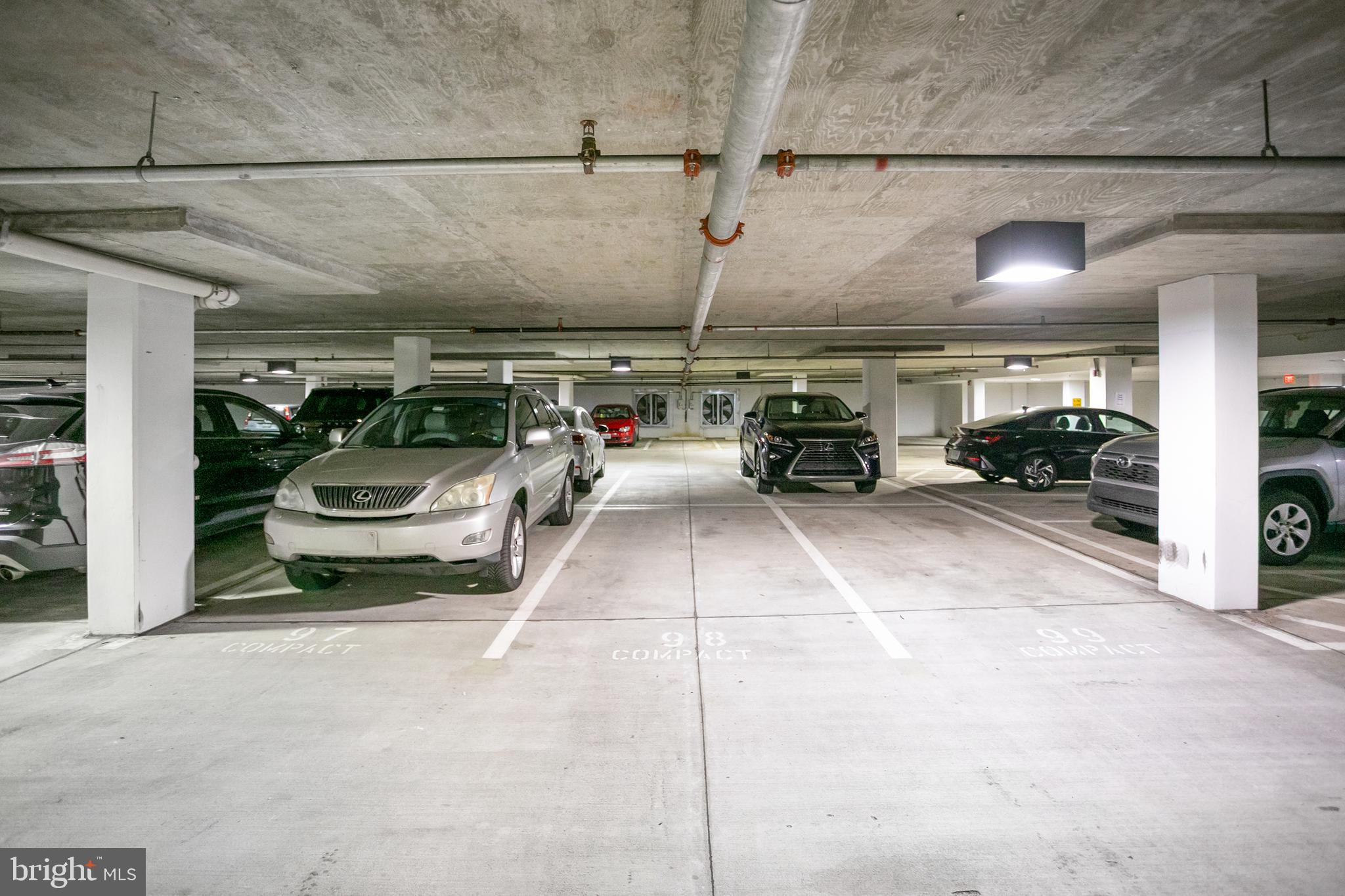 400 Cameron Station Boulevard, Unit 308 Alexandria, VA 22304 - Photo 22 of 46 a view of parking garage with cars parked