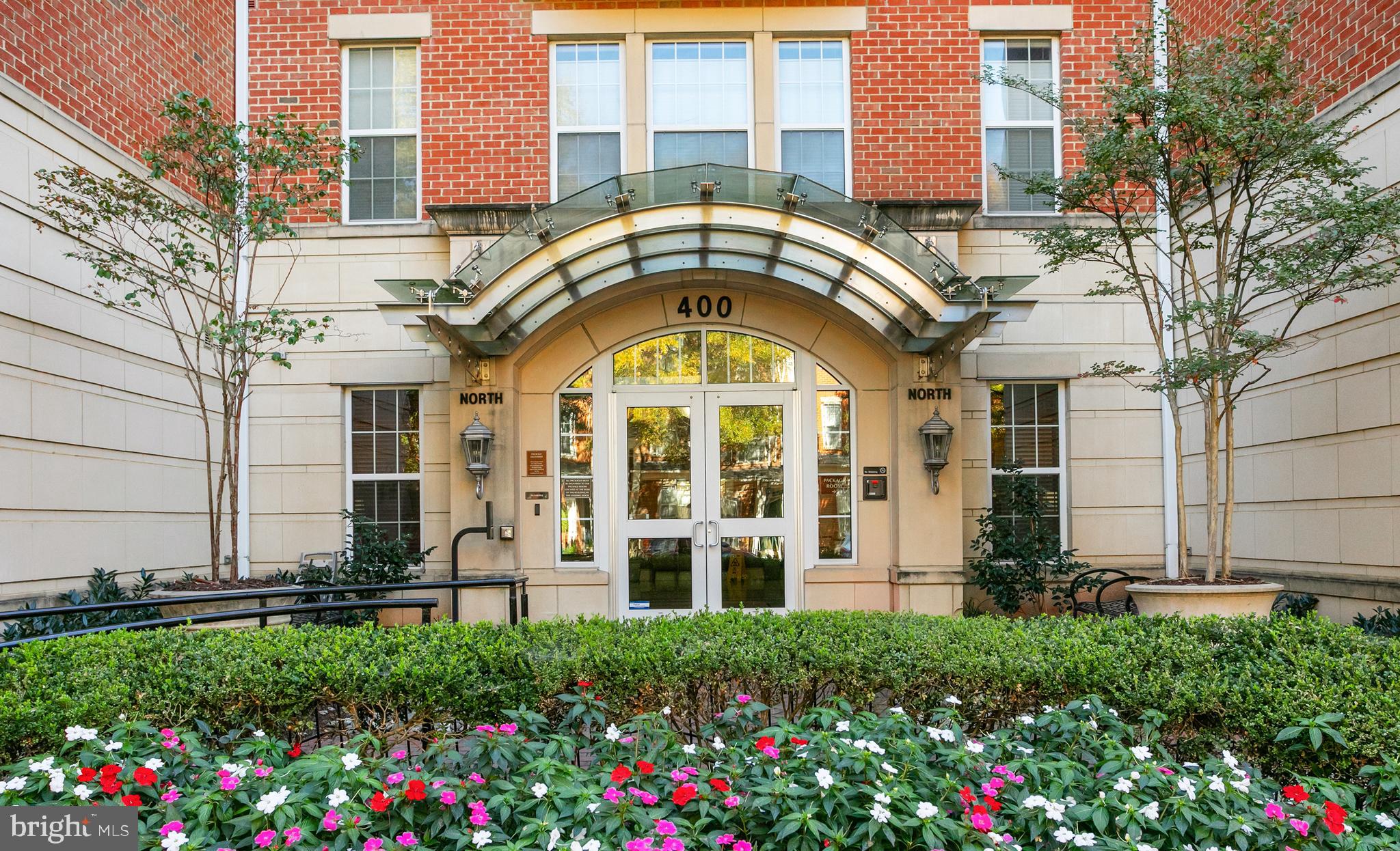 400 Cameron Station Boulevard, Unit 308 Alexandria, VA 22304 - Photo 31 of 46 a view of a building with a garden