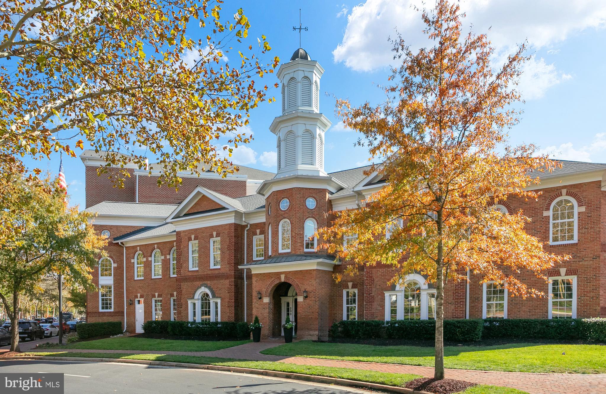 400 Cameron Station Boulevard, Unit 308 Alexandria, VA 22304 - Photo 37 of 46 a view of a brick building next to a yard
