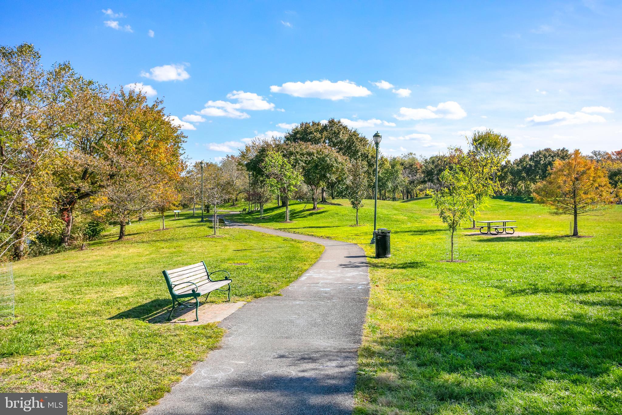 400 Cameron Station Boulevard, Unit 308 Alexandria, VA 22304 - Photo 44 of 46 a view of a lake with a big yard