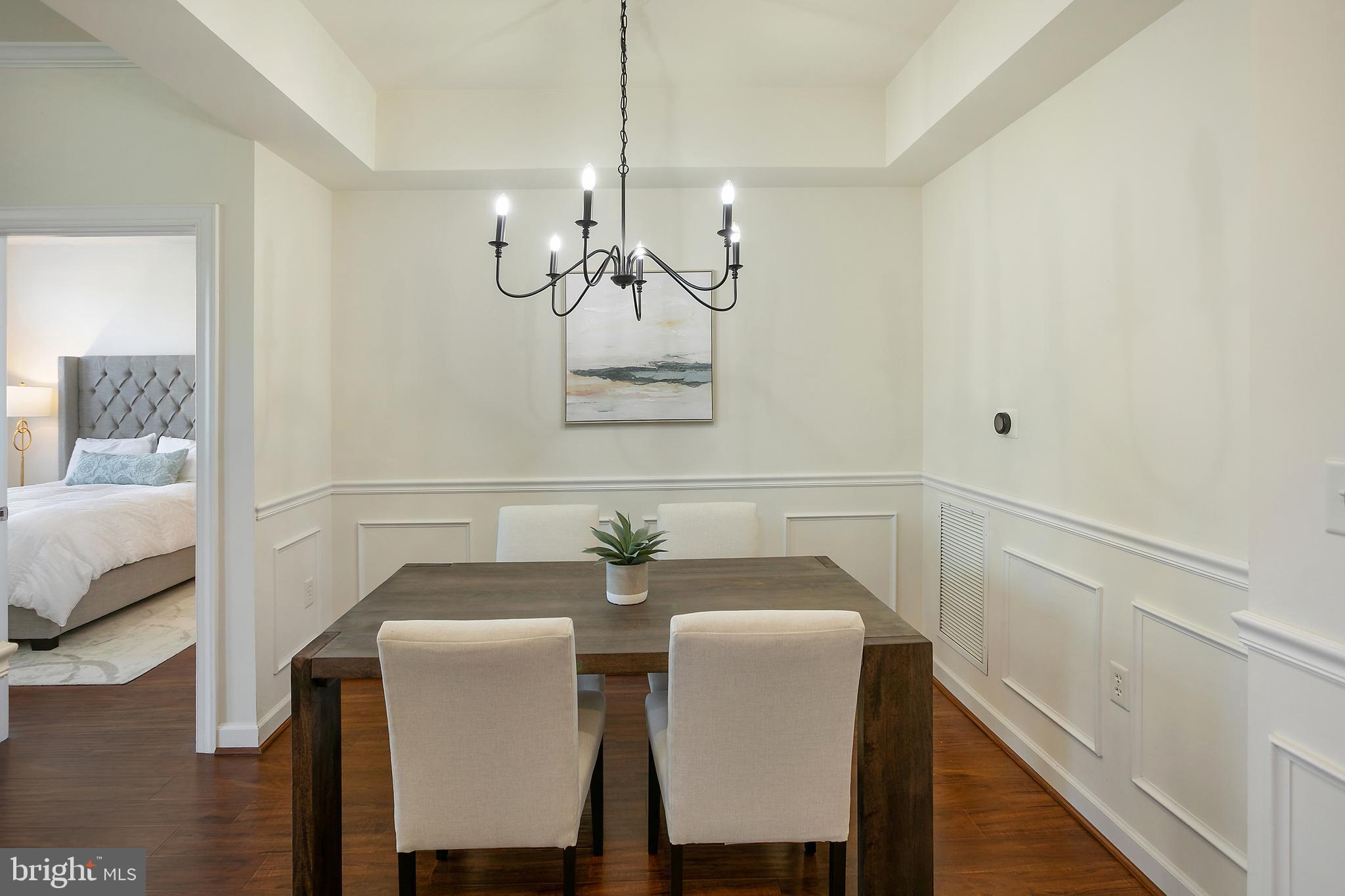 400 Cameron Station Boulevard, Unit 308 Alexandria, VA 22304 - Photo 6 of 46 a dining room with furniture and window