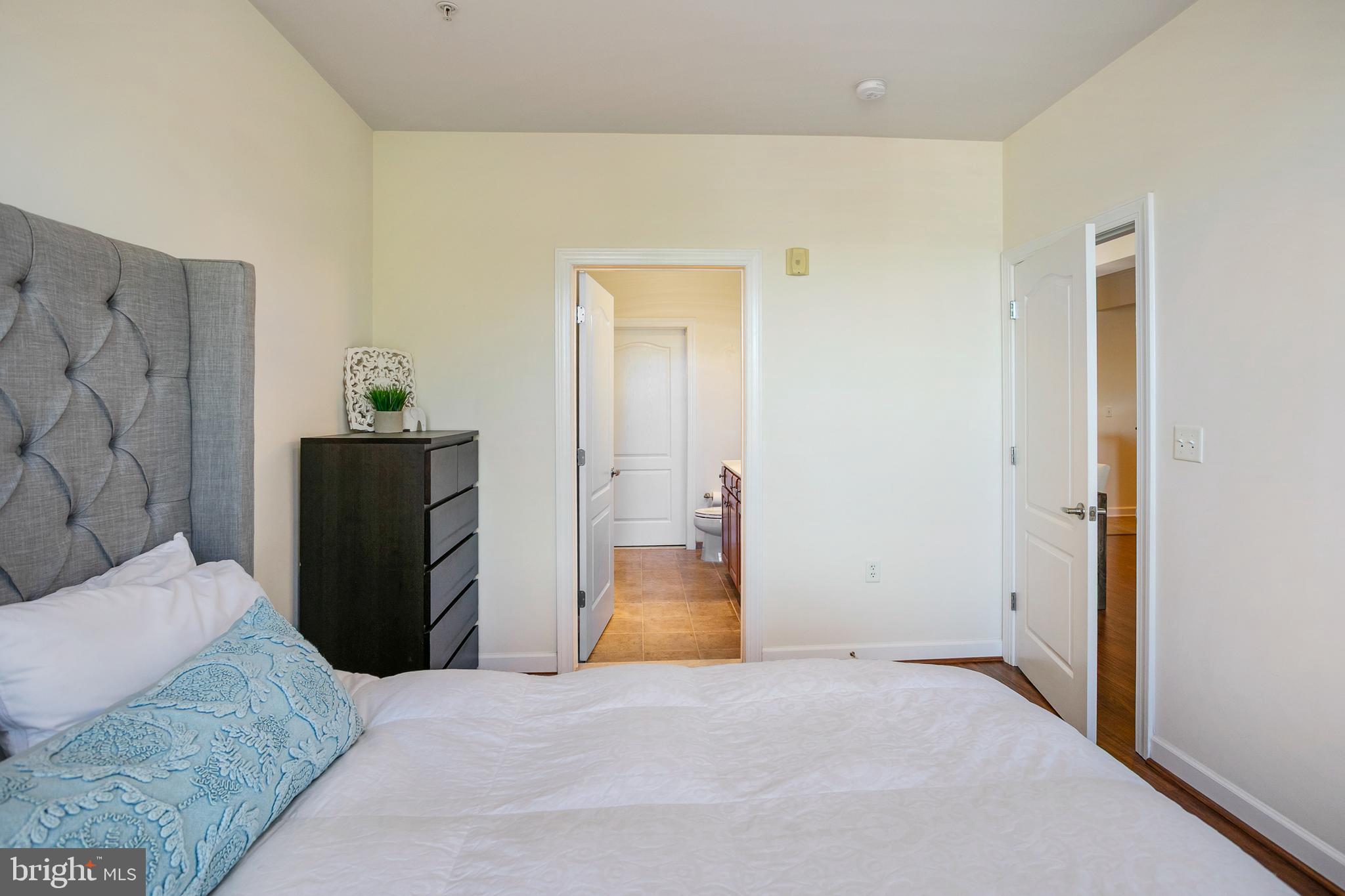 400 Cameron Station Boulevard, Unit 308 Alexandria, VA 22304 - Photo 10 of 46 a view of a bedroom with closet