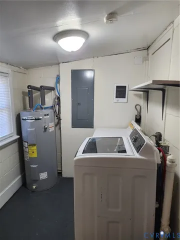a kitchen with refrigerator and sink