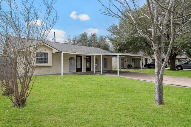 a house view with a garden space