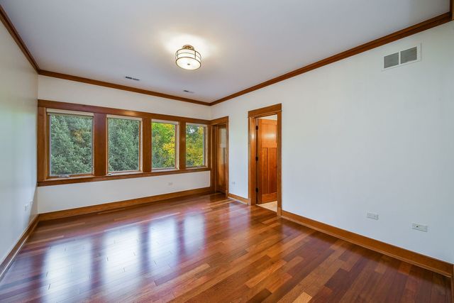 a view of deck with wooden floor and outdoor seating