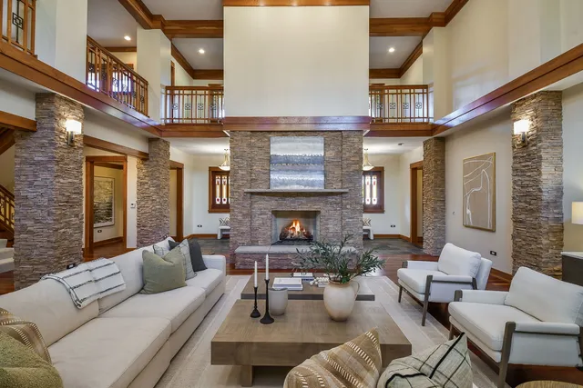 a living room with furniture and a table